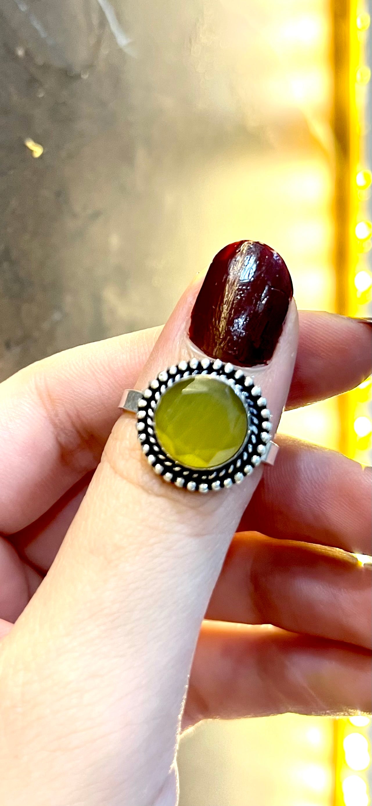 Round olive green gem stone